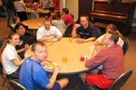 Playing card games after volleyball on Friday nights.